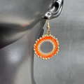 The Oshun Earrings in "Carrot Cake"