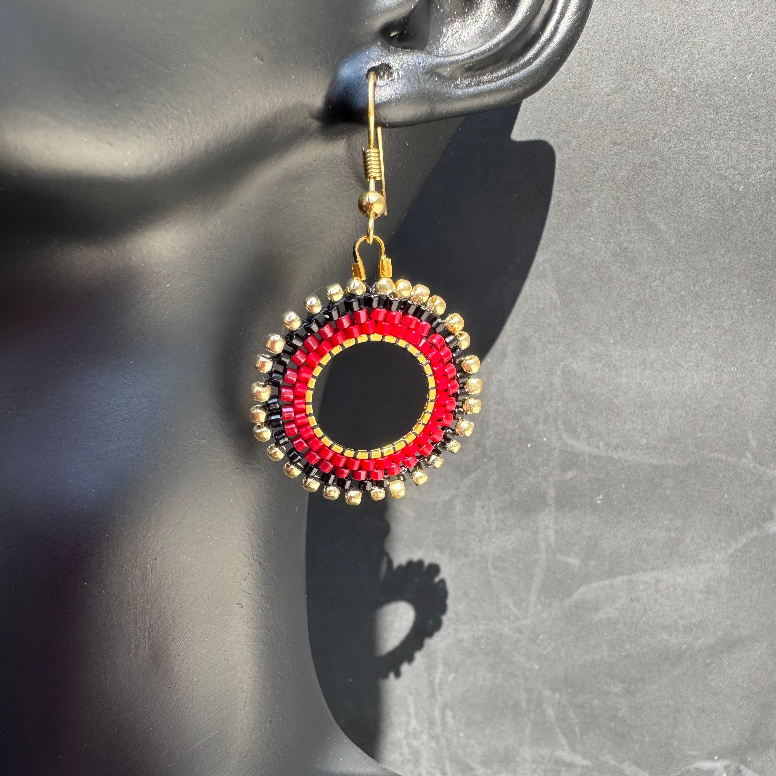 The Oshun Earrings in "Vampire Kiss"