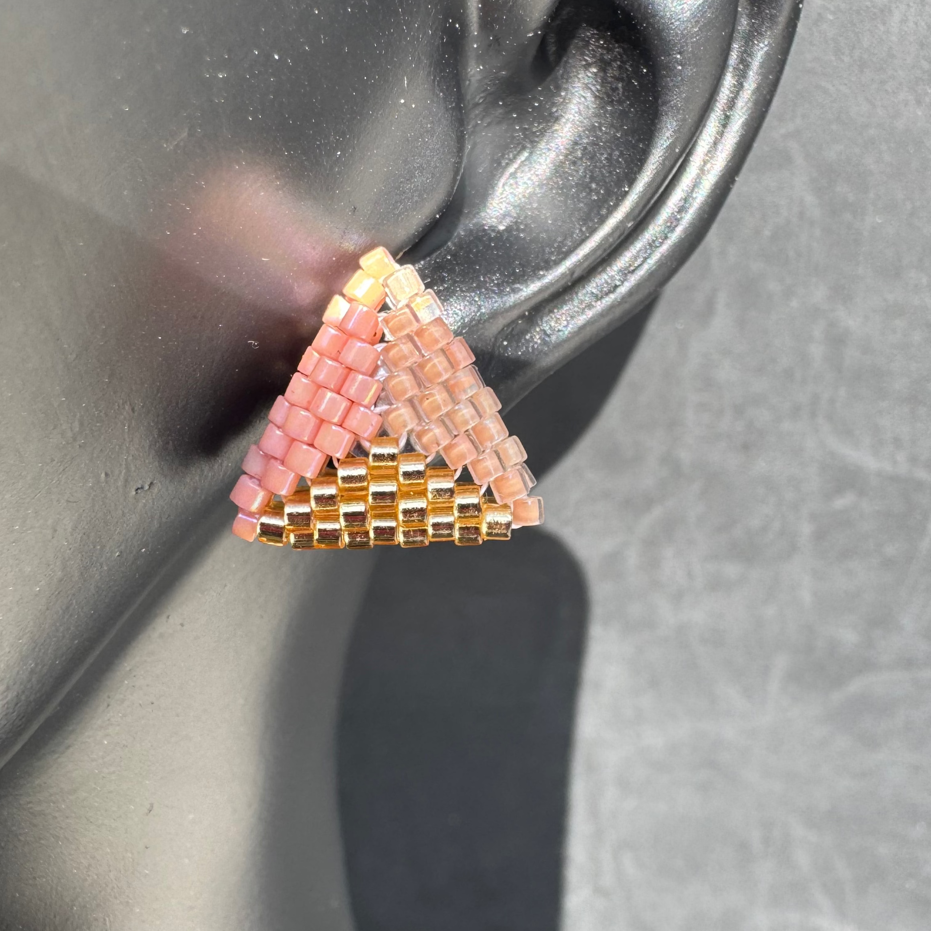 The Trifecta Stud in "Coral Beaches"